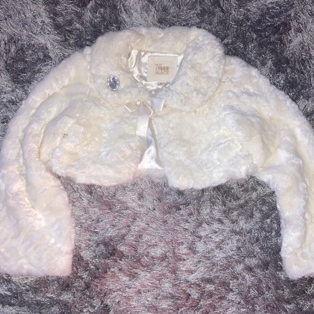 Cream fur coat